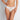 Model wears Sofia Thong in BRIGHT WHITE. On body front view