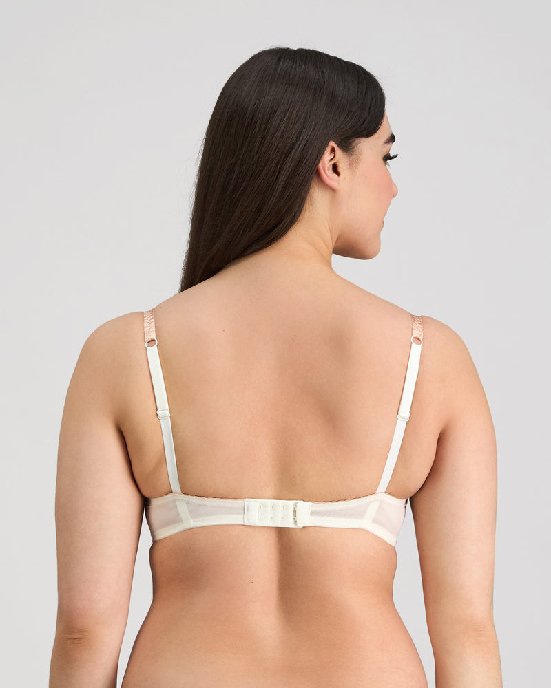 Model wears Sofia Underwire Bra in CAMEO. On body back view