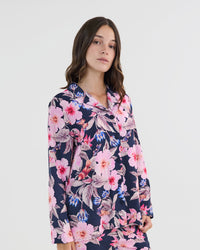 Model wears Mihika Sleeping Long Sleeve PJ Top in HONOLULU HAZE PRINT. On body side view