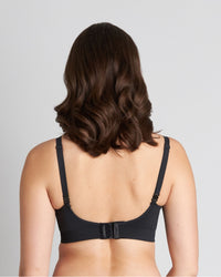 Model wears Balance Wire Free Bra in BLACK. On body back view