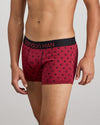 Model wears Retros Print Mens Trunk in DISRUPTED SPOT PRINT. On body side view
