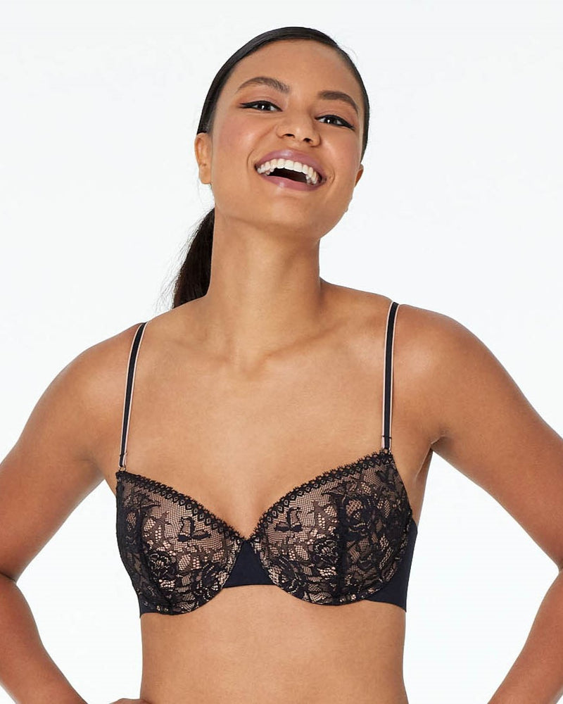 Model wears Naturally Me Contour Bra in BLACK. On body front view