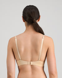 Model wears Simply Seamless Wire Free Bra in Nude. On body back view