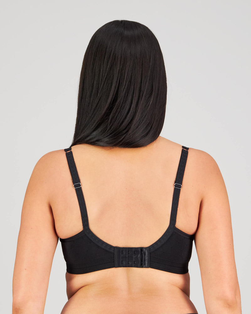 Model wears Bendon Body Contour Bra in BLACK. On body back view