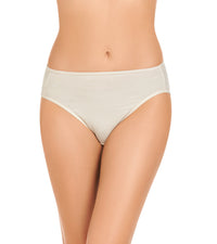 Model wears Freestyle High Cut Brief in CHAMPAGNE. On body front view