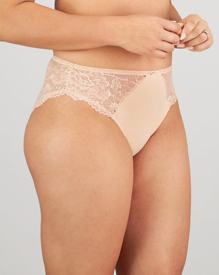 Model wears Laurel High Cut Brief in LATTE. On body side view