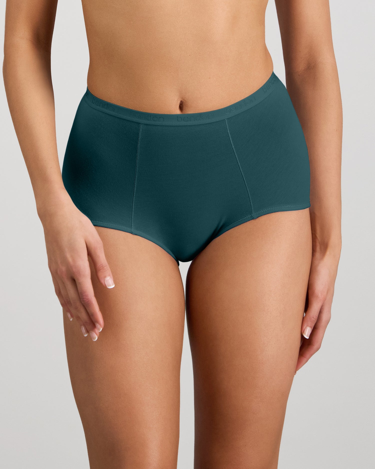 Model wears Body Cotton Full Brief in MEDITERRANEA. On body front view
