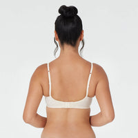 Model wears Yvette Underwire Bra in NATURAL. On body back view