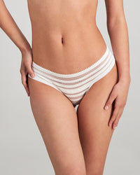 Model wears Morning Lola Midi in WHITE. On body front view