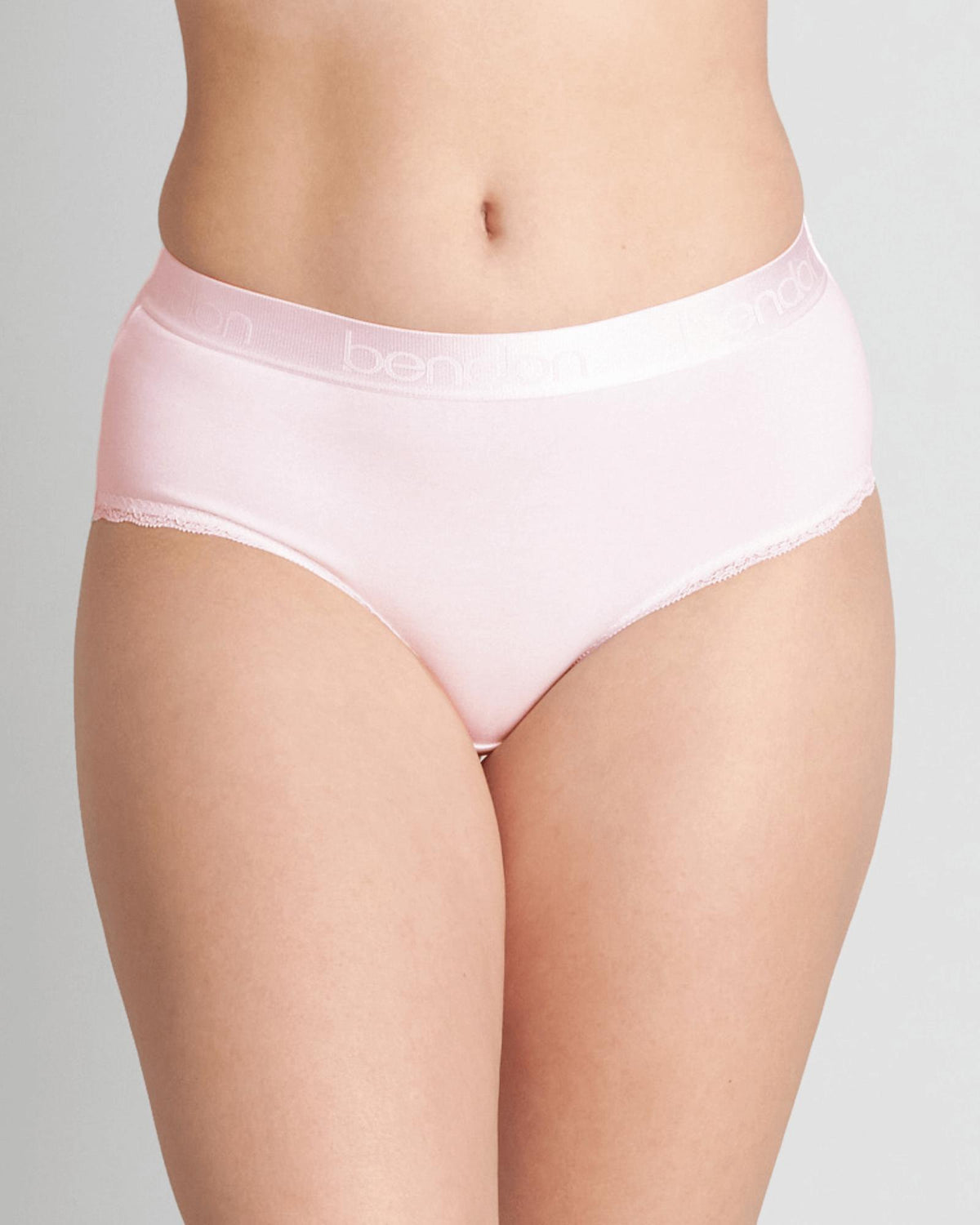 Model wears Cotton Logo Full Brief in ICY PINK. On body front view