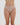 Model wears All Lacey Thong in LATTE. On body front view