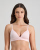 Model wears Simply Seamless Wire Free Bra in ICY PINK/WHITE STRIPE. On body front view