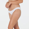 Model wears Clemence Bikini in WHITE. On body side view