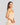 Model wears Simply Seamless Camisole in Nude. On body front view
