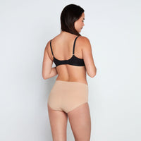 Model wears Medium Control Full Brief in CARAMEL. On body back view