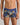 Model wears Retros Print Mens Trunk in WILD CAMO PRINT. On body front view