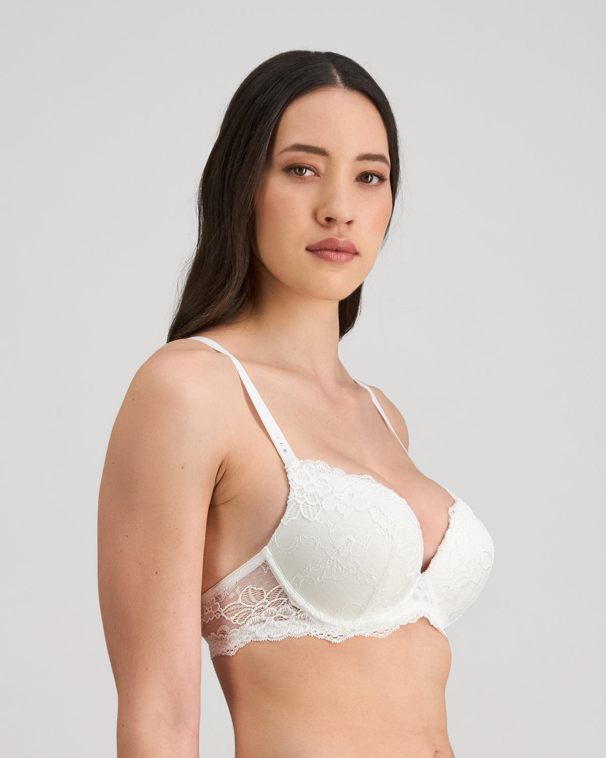 Model wears My Fit Lace Push Up Bra in WHITE. On body side view
