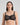 Model wears Aria Underwire Bra in BLACK. On body front view