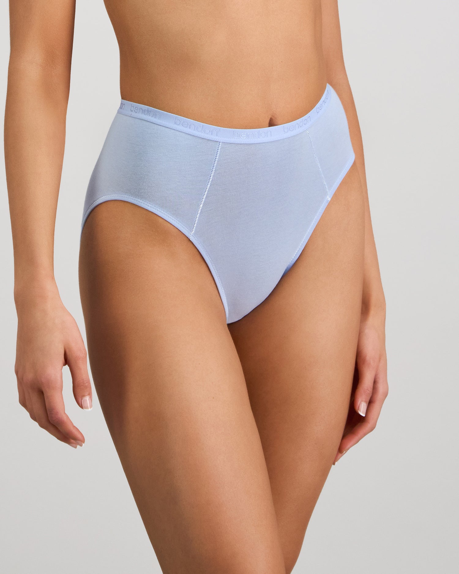 Model wears Body Cotton High Cut Brief in SKYWAY. On body side view