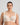 Model wears Midnight Express Underwire Bra in EGRET. On body front view