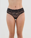 Model wears Lacey Brazilian in BLACK. On body front view