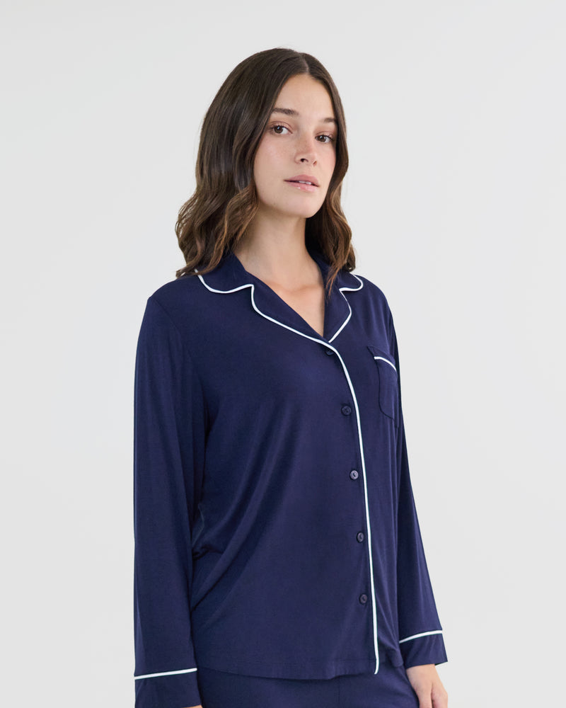 Model wears Bamboo Bliss Long Sleeve PJ Top in NAVY BLAZER. On body side view