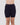 Model wears Smoothing Bodywear Chafer Short in BLACK. On body front view