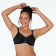 Model wears Active Underwire Bra in BLACK. On body front view