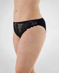 Model wears Embrace Bikini in BLACK. On body side view