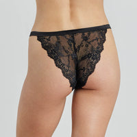 Model wears Fleur Midi in BLACK. On body back view