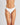 Model wears Body Cotton Thong in WHITE. On body front view