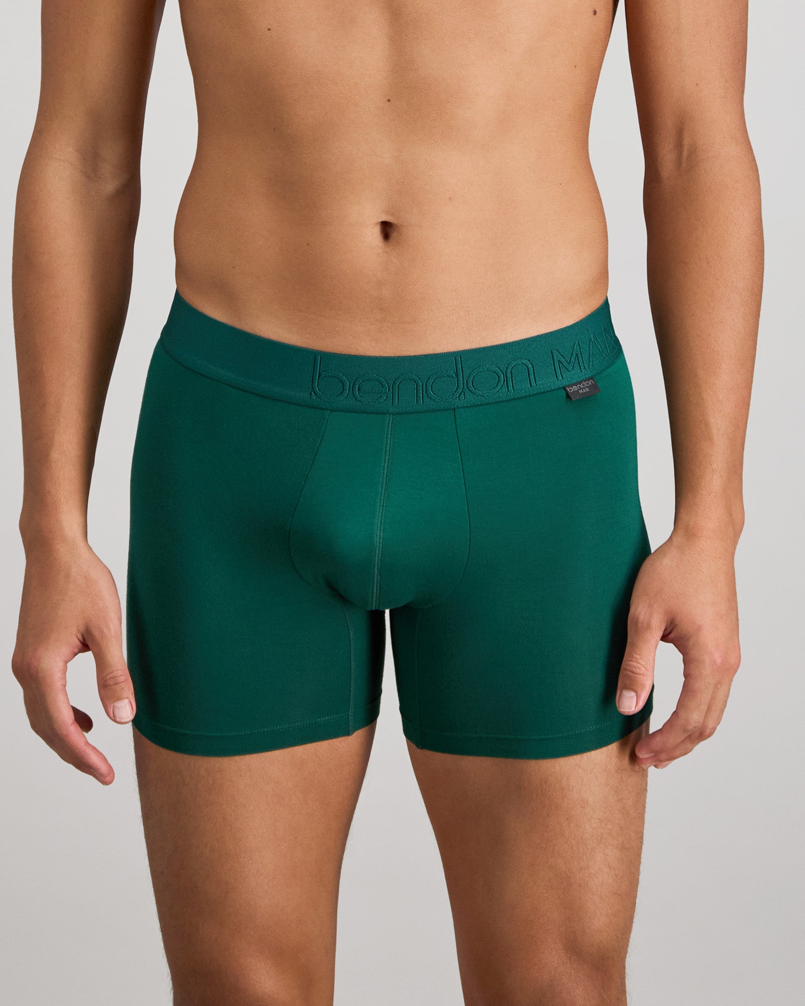 Model wears Bamboo Mens Trunk in RAIN FOREST. On body front view