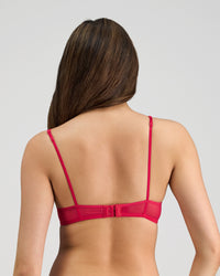 Model wears Skinlite Underwire Bra in JAZZY. On body back view