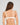 Model wears Dekota Devine Contour Bra in SUGAR. On body back view