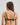 Model wears Lost Paradise Contour Bra in BLACK PRINT. On body back view
