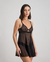 Model wears Ava Rose Babydoll in BLACK. On body side view