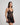 Model wears Ava Rose Babydoll in BLACK. On body side view