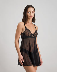 Model wears Ava Rose Babydoll in BLACK. On body side view