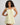Model wears Bonbon Babydoll in TRANSPARENT YELLOW. On body front view