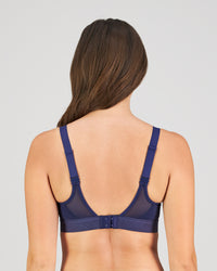 Model wears Bendon Breathe Contour Bra in MEDIEVAL/RAINFOREST. On body back view