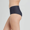 Model wears Flo Heavy Full Brief in BLACK. On body side view