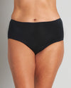 Model wears Au Naturel Full Brief in BLACK. On body front view