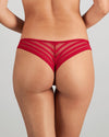 Model wears Morning Lola Thong in JESTER RED. On body back view