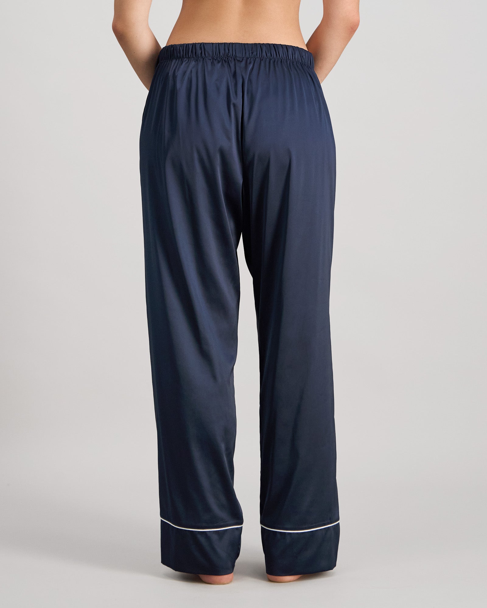 Model wears Holly Long PJ Pant in NAVY BLAZER. On body back view