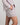 Model wears Cosy Flannel Short Pj in PINK-A-BOO. On body side view