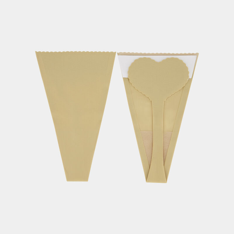 Model wears Stick On Thong 2Pk in Nude. On body front view