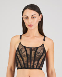 Model wears Scarlet Lover Corset in BLACK. On body front view