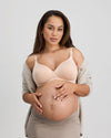 Model wears Bendon Nurture Maternity Bra in LATTE. On body front view