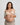 Model wears Bendon Nurture Maternity Bra in LATTE. On body front view