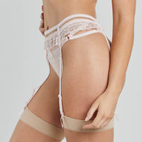 Model wears Gia Suspender in HEAVENLY PINK. On body side view